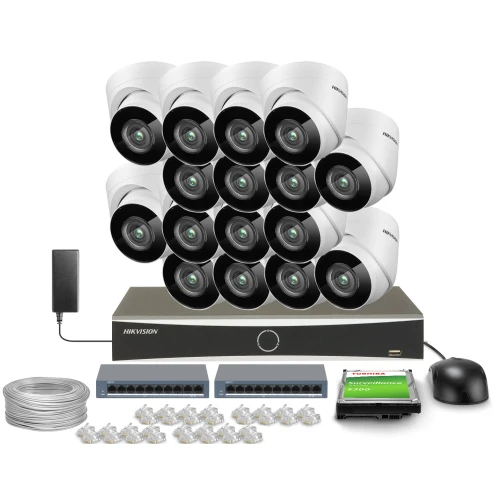 The image shows a comprehensive surveillance system package, including sixteen dome cameras, a digital video recorder, and essential accessories like cables and connectors. This setup is designed for extensive monitoring needs, providing high-quality security coverage.