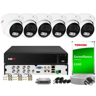 The image shows a comprehensive surveillance system kit, including six dome cameras, a DVR unit, and a Toshiba surveillance hard drive. Additional components such as cables, connectors, and a power supply are also included, providing a complete setup for monitoring needs.