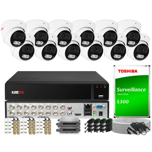 The image shows a comprehensive surveillance system package, including multiple dome cameras, a central recording unit, and a Toshiba S300 surveillance hard drive. The set also includes various cables, connectors, and mounting accessories for complete installation.