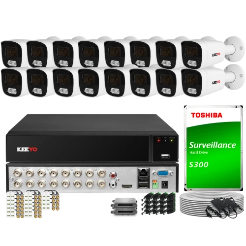 The image shows a comprehensive surveillance system package, including multiple security cameras, a recording unit, and a Toshiba surveillance hard drive. The set also includes various cables and connectors for installation.