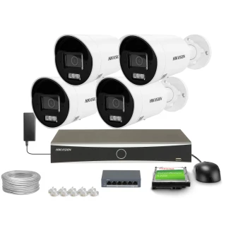 A comprehensive surveillance kit featuring four Hikvision security cameras, a digital video recorder, and essential accessories like cables and connectors. The set includes a hard drive for storage and a mouse for easy navigation.