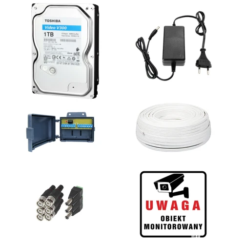 Surveillance kit featuring a Toshiba 1TB hard drive, power adapter, and a roll of white cable. Includes connectors, a junction box, and a "Uwaga Obiekt Monitorowany" warning sign.