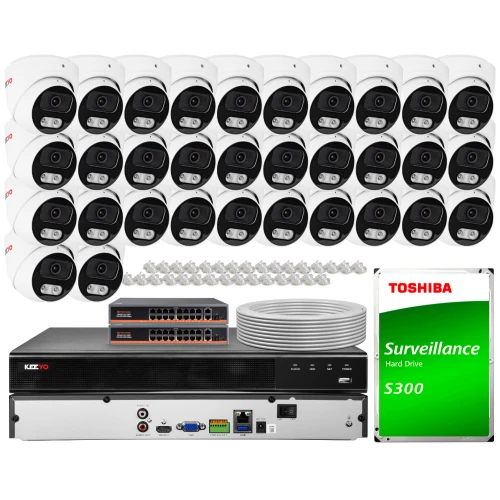 The image shows a comprehensive IP surveillance system featuring multiple dome cameras, network switches, and a central recording unit. Additionally, a Toshiba S300 surveillance hard drive is included, along with cables and connectors for installation.