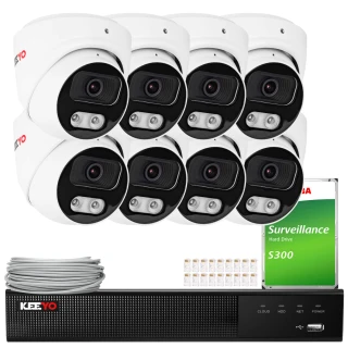 The image shows a comprehensive IP surveillance system featuring eight white dome cameras, a digital video recorder, and a surveillance hard drive. The set also includes a bundle of cables and connectors for easy installation.