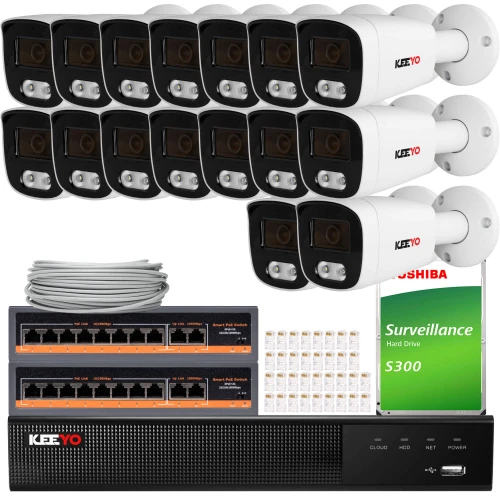 The image shows a comprehensive IP surveillance system featuring twelve KeeYo security cameras, a network video recorder, and a Toshiba surveillance hard drive. Included are two network switches, a bundle of Ethernet cables, and connectors for easy installation.
