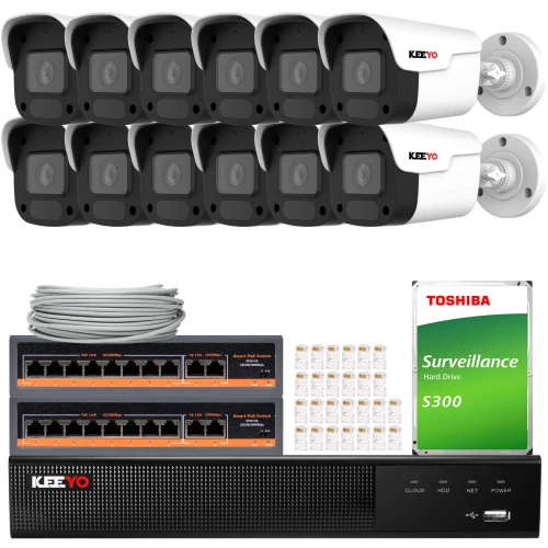 The image shows a comprehensive IP surveillance system featuring twelve white and black security cameras, a network video recorder, and a Toshiba S300 surveillance hard drive. Also included are two network switches, a bundle of Ethernet cables, and a set of connectors.