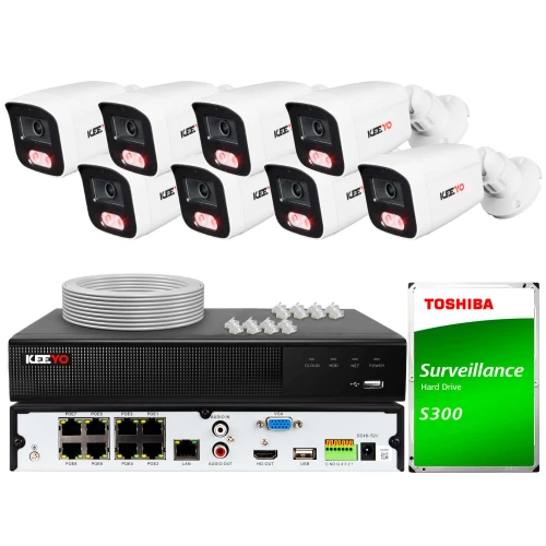 The image shows a complete surveillance system package, including eight white Keeyo security cameras, a DVR unit, and a Toshiba S300 surveillance hard drive. Also included are network cables and connectors for easy installation.