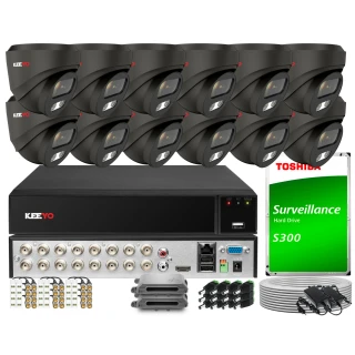The image shows a comprehensive surveillance system package, including multiple black security cameras, a central recording unit, and a Toshiba surveillance hard drive. Additional components such as cables, connectors, and mounting brackets are also included, providing a complete setup for monitoring needs.