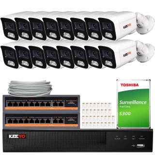 The image shows a comprehensive surveillance system package, including multiple Keeyo security cameras, a network video recorder, and a Toshiba surveillance hard drive. Also included are network cables and connectors, providing a complete setup for monitoring and recording.