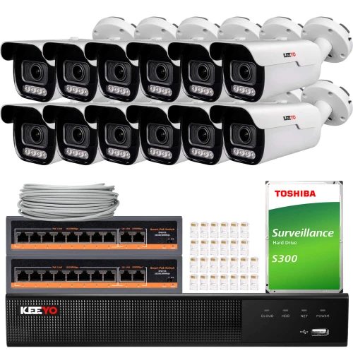 The image shows a comprehensive surveillance system package, including multiple Keeyo security cameras, a Toshiba S300 surveillance hard drive, and networking equipment. The set also features cables and connectors, providing a complete solution for monitoring needs.