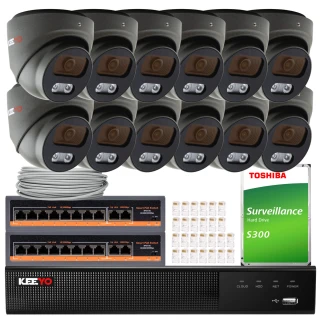 The image shows a comprehensive surveillance system package, including multiple dome cameras, a network video recorder, and a Toshiba surveillance hard drive. The set also includes cables, connectors, and two network switches for complete installation.