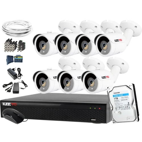 The image shows a comprehensive surveillance system kit, including eight white security cameras, a digital video recorder, a hard drive, and various cables and connectors. The kit also includes a power adapter and a computer mouse, providing a complete setup for monitoring and recording.