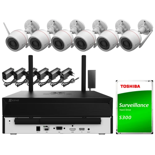 The image shows a comprehensive Wi-Fi surveillance system, featuring six white security cameras with mounting brackets and a central recording unit. Included are power adapters for each camera and a Toshiba surveillance hard drive for data storage.