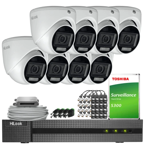 The image shows a comprehensive surveillance system package, including eight white dome cameras, a digital video recorder, a Toshiba surveillance hard drive, and various cables and connectors. This setup is designed for high-quality monitoring and security purposes.