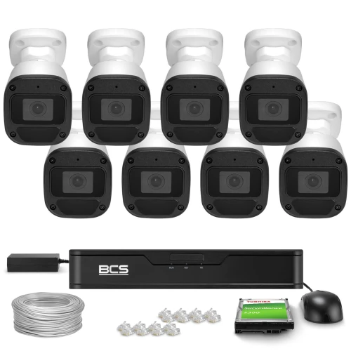 The image shows a complete surveillance system featuring eight black and white security cameras, a recording unit, cables, connectors, and a hard drive. This setup is designed for comprehensive monitoring and security coverage.