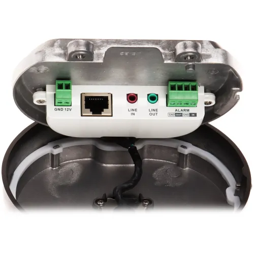 The image shows the internal connections of a security camera, featuring ports for power, Ethernet, audio input and output, and alarm connections. The camera's casing is open, revealing green terminal blocks and labeled ports for easy installation.