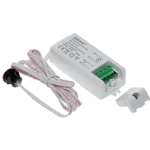 A white electronic device with multiple connection ports and a detachable cover is shown alongside a coiled cable with a sensor. The product features clear labeling and symbols indicating its electrical specifications and safety certifications.