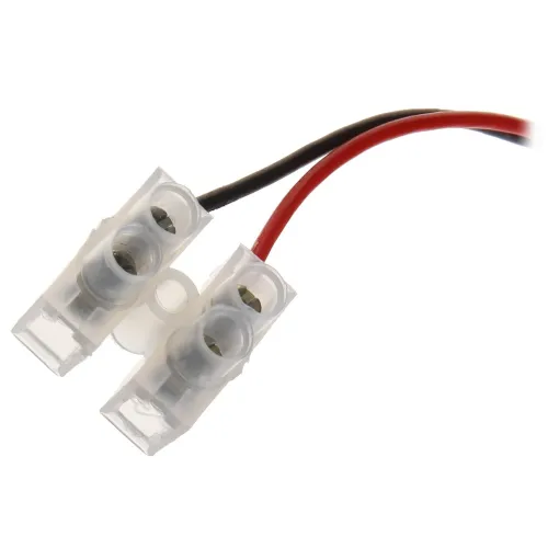 The image shows a transparent plastic power connector with two wires, one red and one black, extending from it. The connector features two slots for secure attachment to compatible devices.