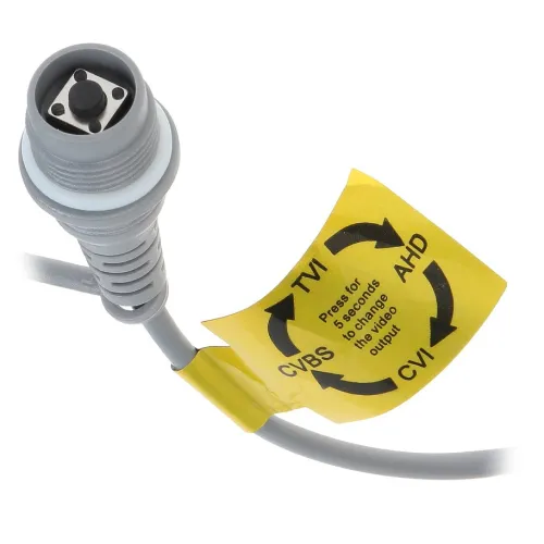 The image shows a gray video cable with a circular connector, featuring a button for switching video standards. A yellow label attached to the cable indicates options for TVI, AHD, CVI, and CVBS formats.